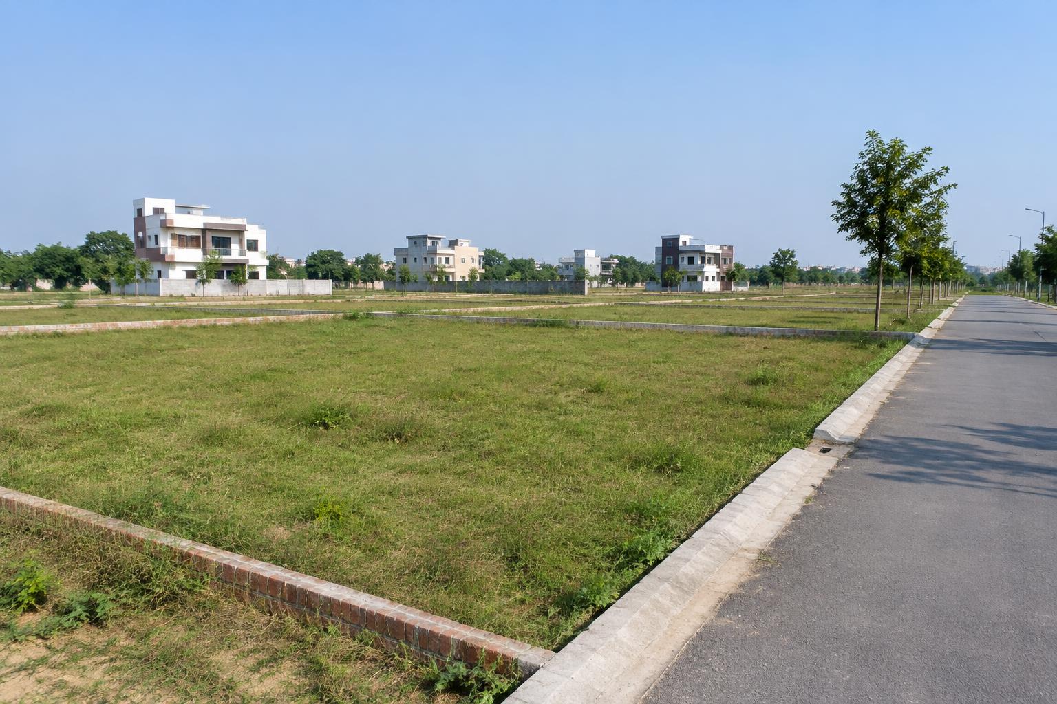 Illustrative residential land beside an access road; not an available listing